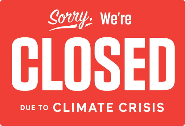 A sign that reads 'Closed for climate emergency' in the style of classic store window signs.